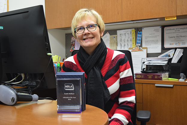 Laurie McHenry, head of technical services at Thormodsgard Law Library, was surprised and proud to receive the 2018 Librarian of the Year award from the North Dakota Library Association. Photo by Dima Williams/UND Today.