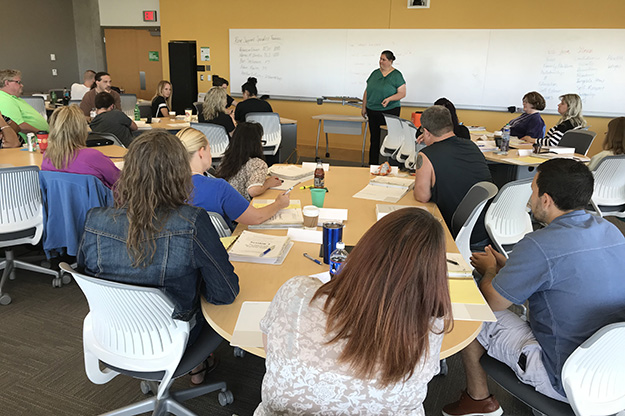 Rebecca Quinn of the Center for Rural Health led a Peer Support Specialist Training Program session in Grand Forks this summer, similarly addressing issues in combating the opioid crisis. Image courtesy of UND School of Medicine & Health Sciences.