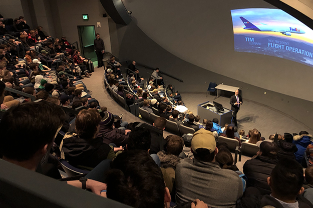 Leonard had the Arthur P. Anderson Atmospherium over capacity on Friday afternoon, capping a day of classroom visits. He spoke with what amounted to hundreds of students about the Purple Runway Aviation Scholarship Program, making good use of his first visit to his alma mater since graduation. Image courtesy of Elizabeth Bjerke.