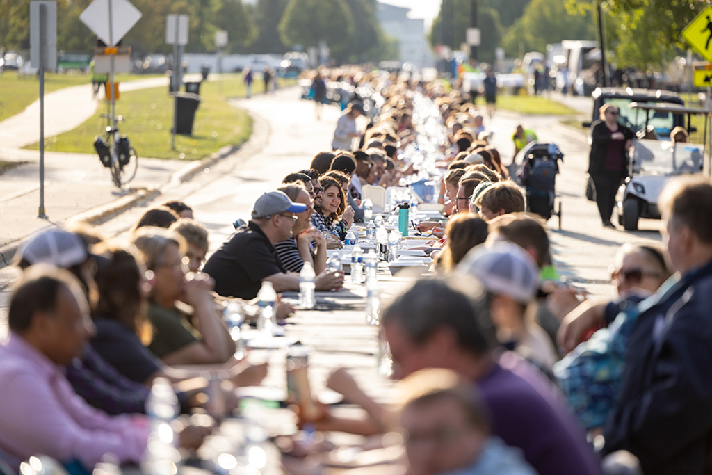 people sit at the Longest Table event