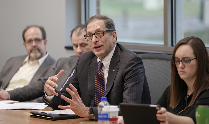 Joshua Wynne amid president's cabinet