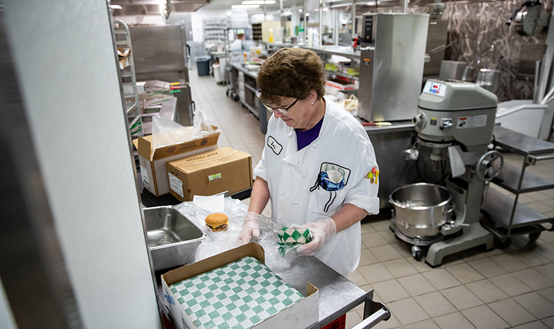 Dining staff member packages meal