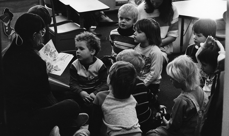 Teacher reading to children