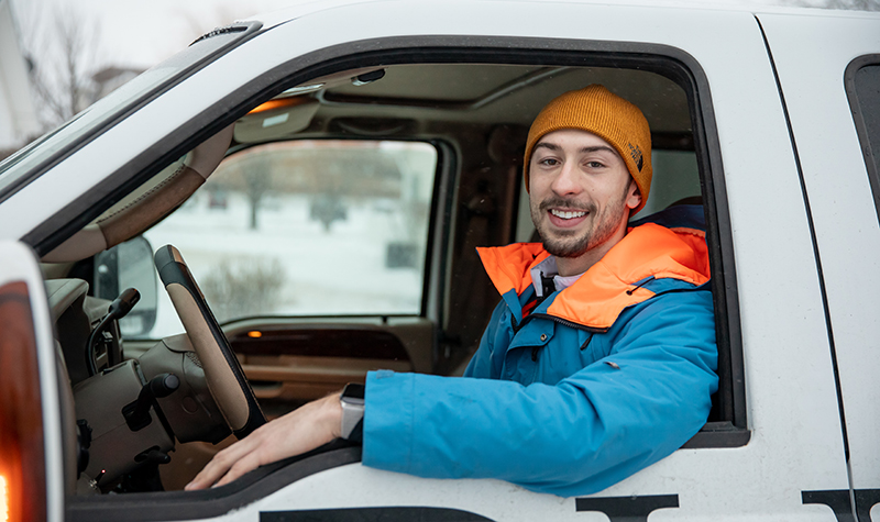Pierson Painter in company truck