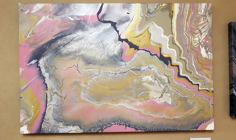 Painting displayed on wall