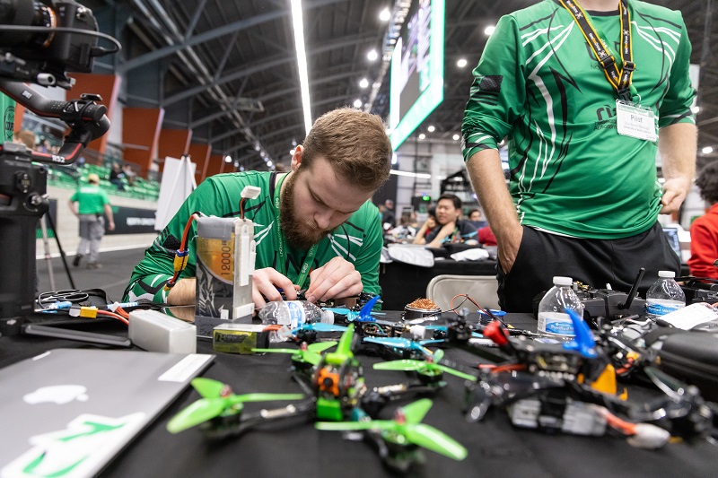 UND team member works on racing drone