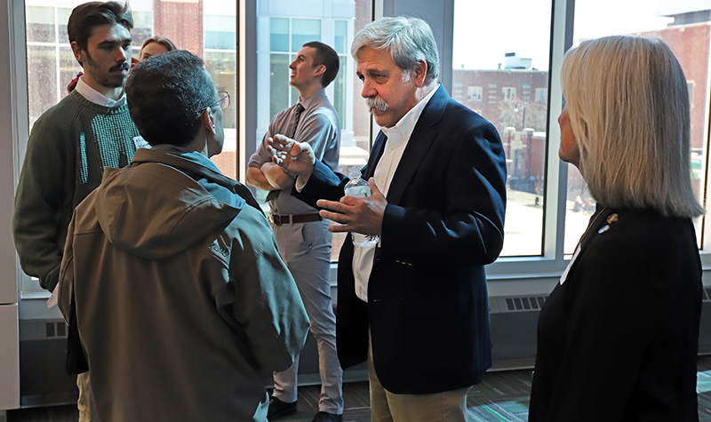 Steve Williams visits with attendees