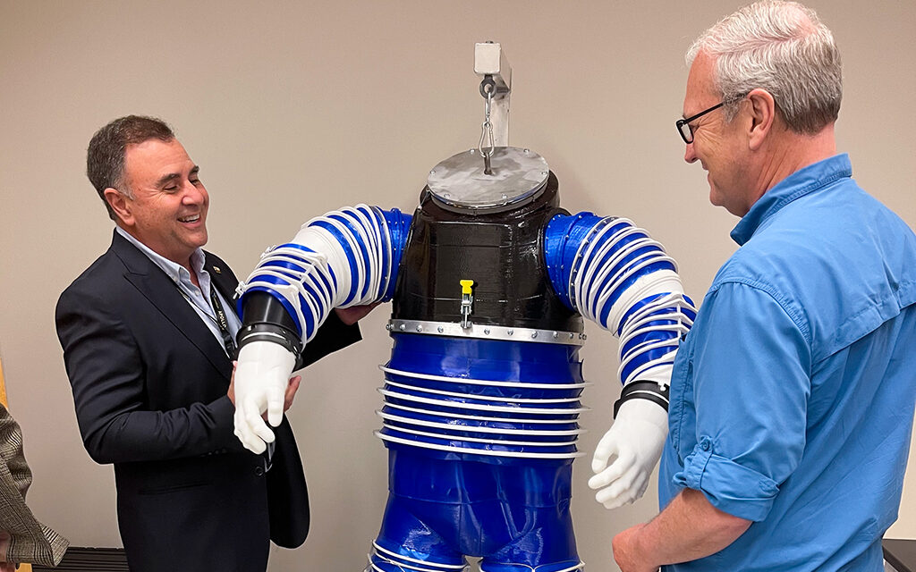 Pablo De Leon shows 3d printed space suit to Sen. Kevin Cramer