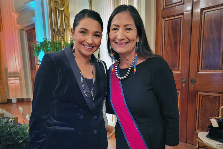 Laine Lyons and Deb Haaland