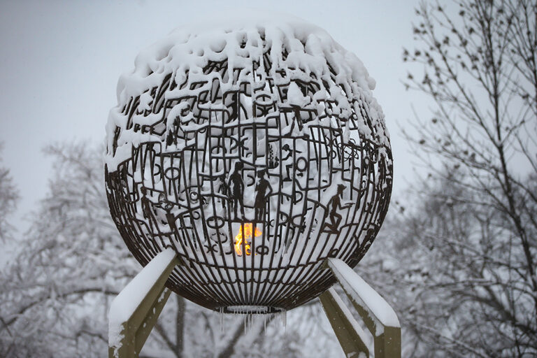 Eternal flame covered in snow