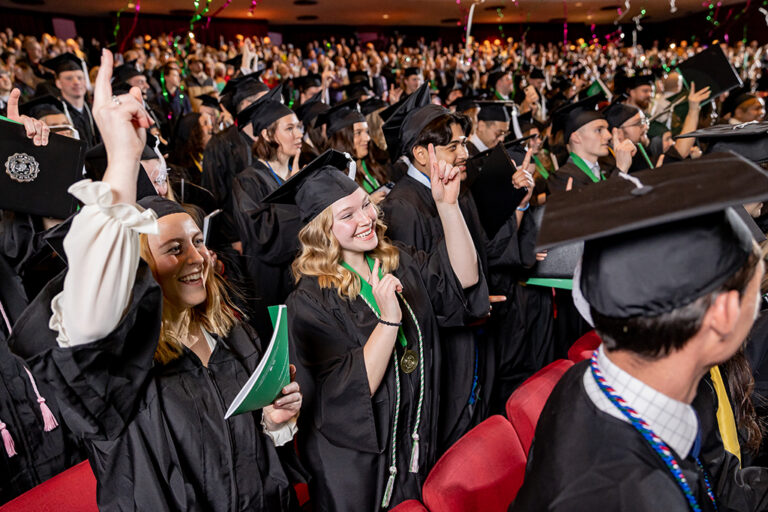 Students celebrating at commencement