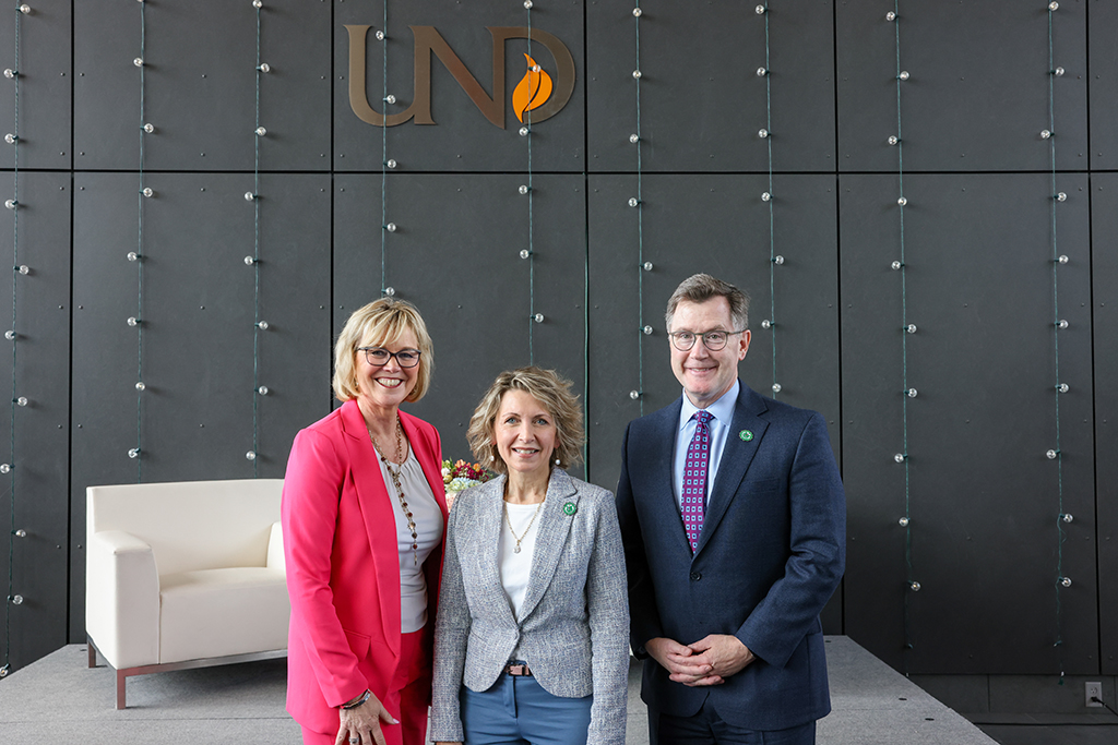 DeAnna Carlson Zink, Marilyn Vetter and President Andy Armacost
