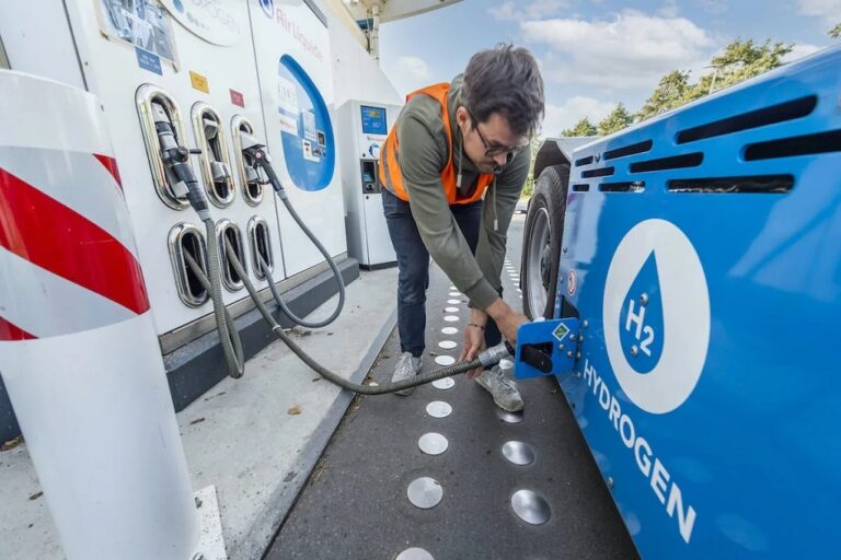 Person refueling hydrogen fuel cell