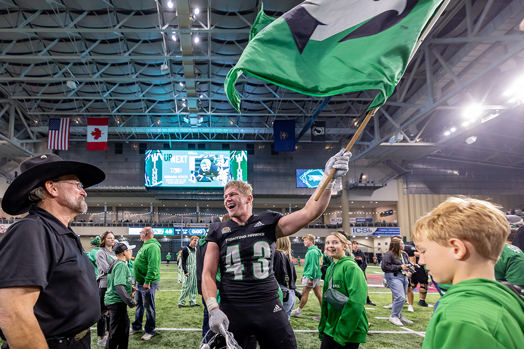 Waving the Fighting Hawks flag
