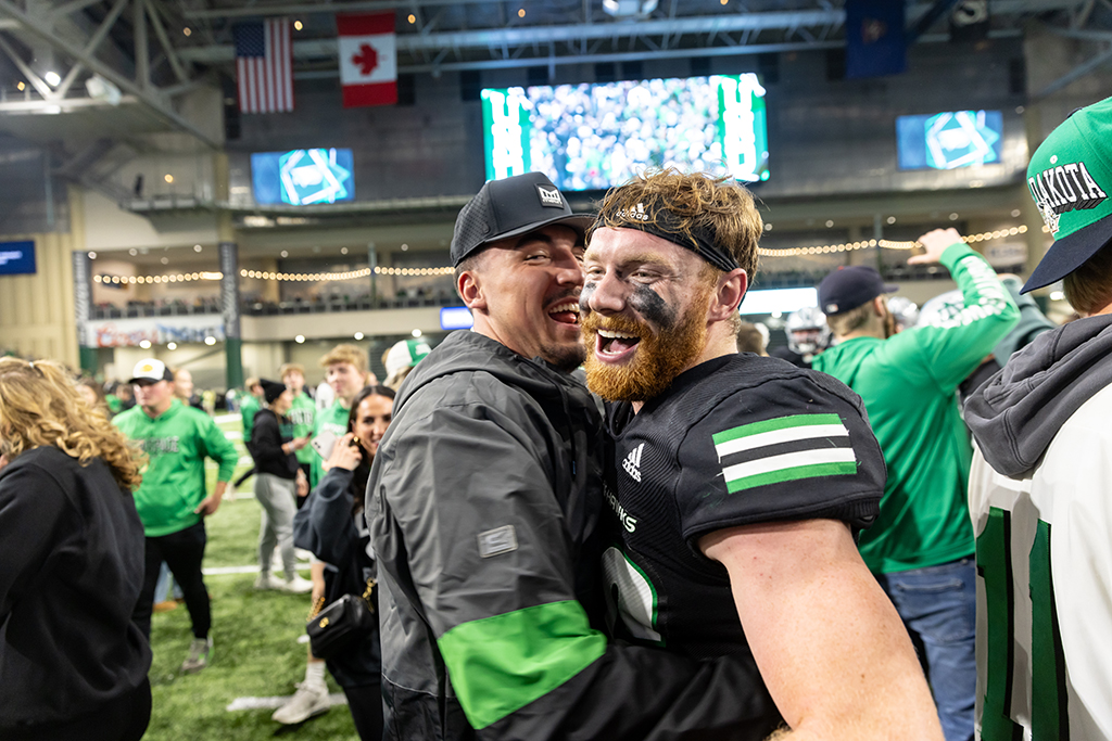 Players and students celebrate