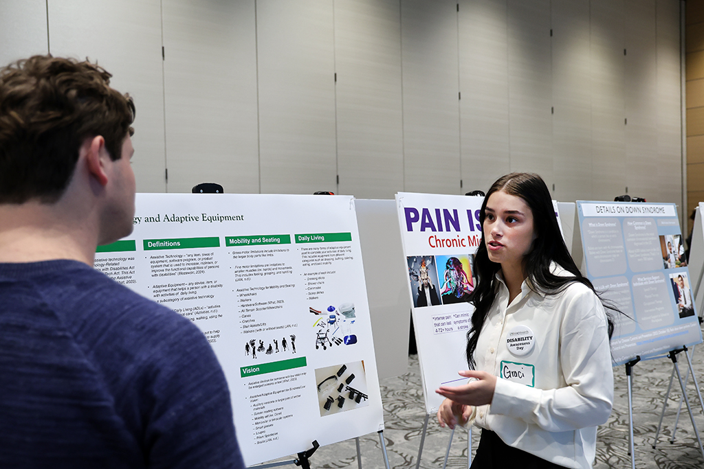 Student speaking about poster