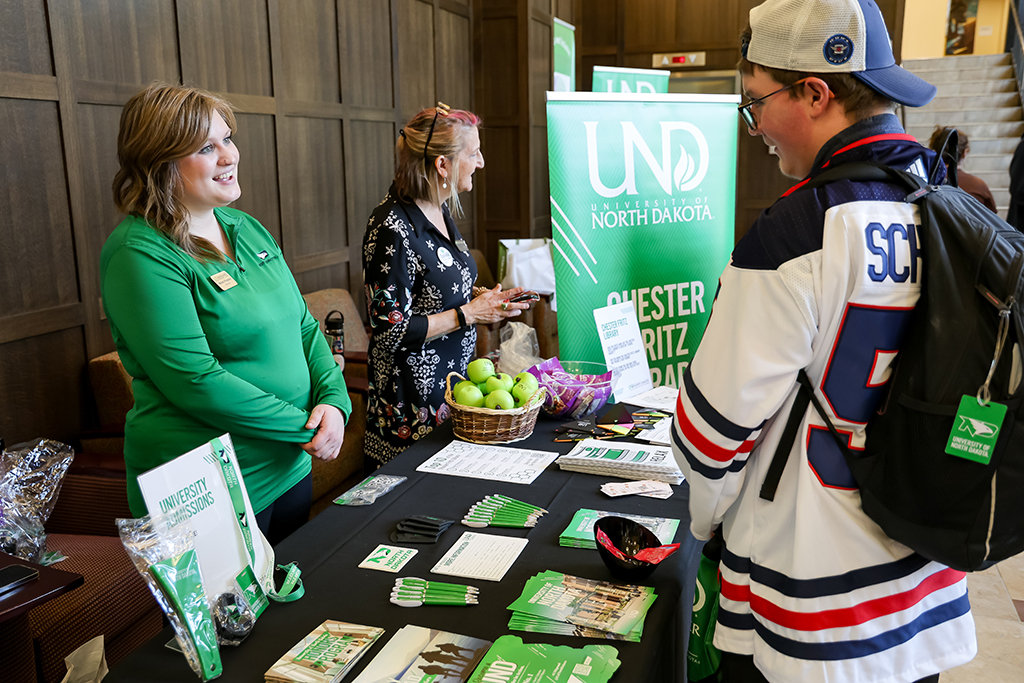 Mariah Pingleton and Danielle Masursky talk to student