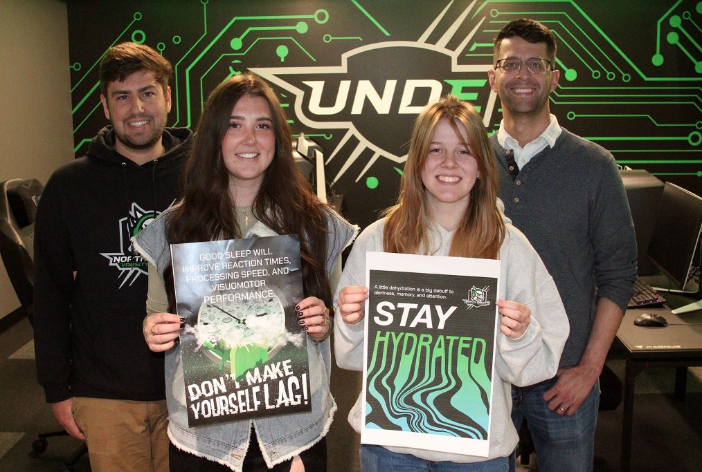 ryan kraus and matt knutson with runners up and posters