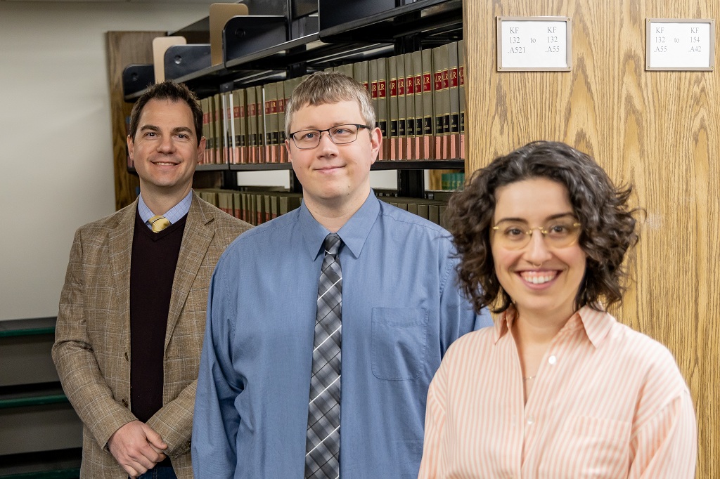 Nikola Datzov, Kyle Foerster and Devon Olson pose for a photo at UND.
