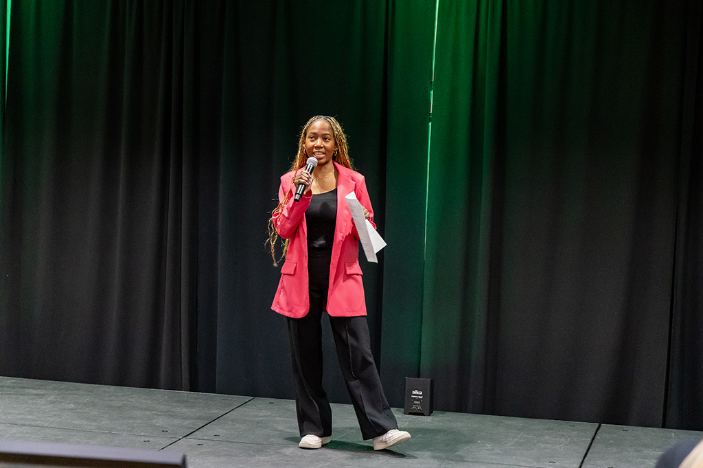 Precious Dada presents at Experience Spotlight event in UND Memorial Union.