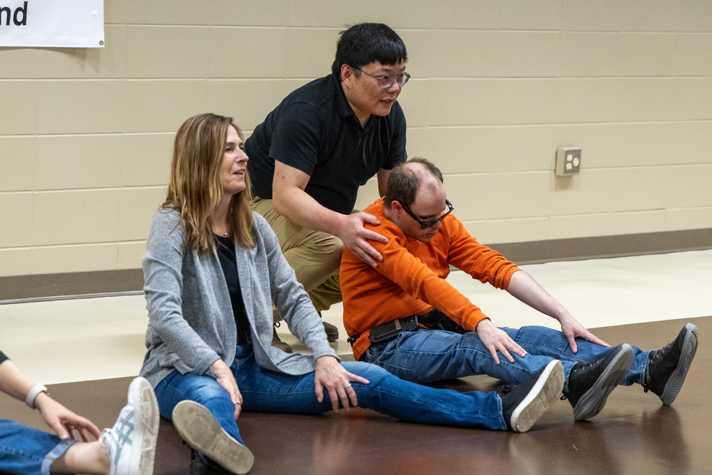 harry liu helping student stretch