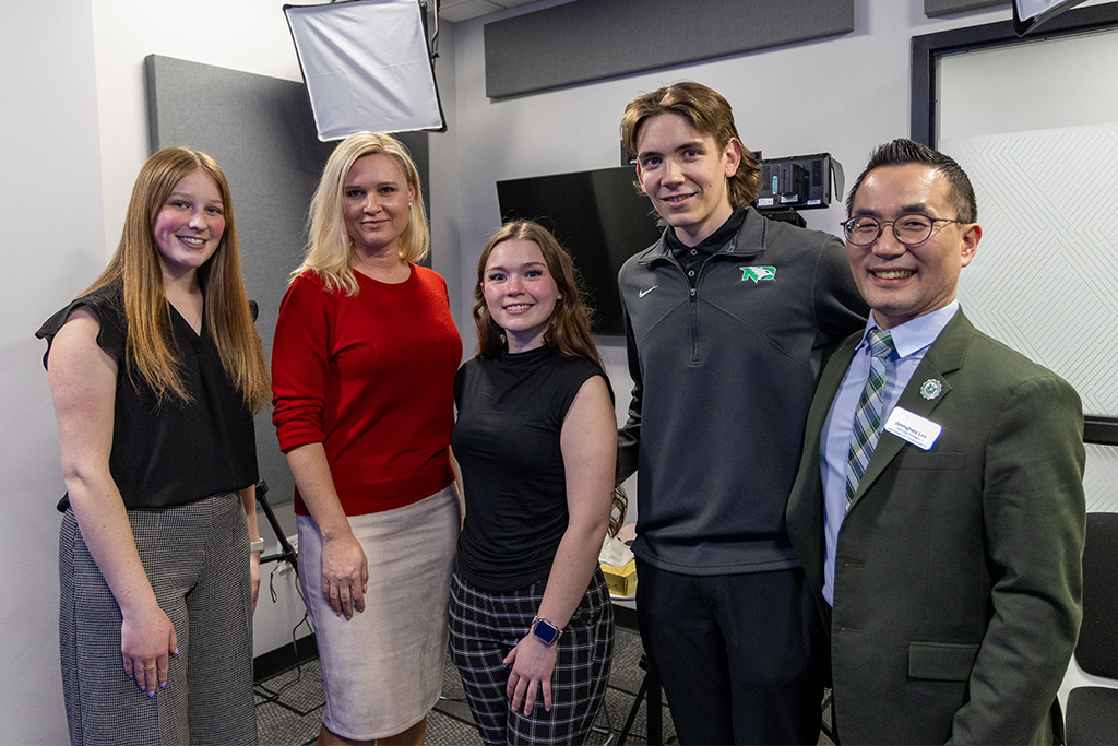 armstrong and students in the studio