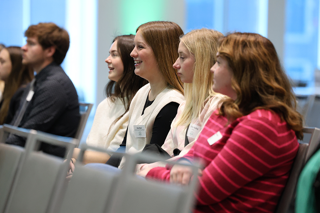 students listening to a talk