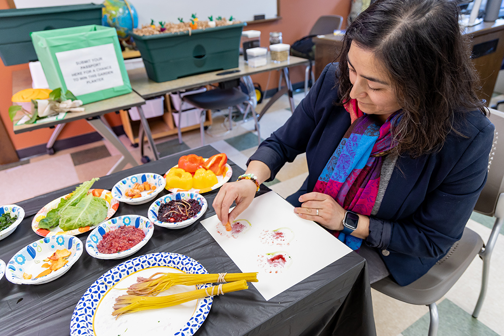 Elizabeth Suazo-Flores creates art with fruit and vegetables