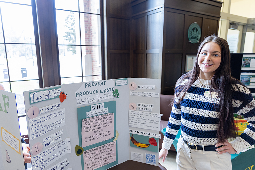 Sophie Johnson presents research at Earth Day.