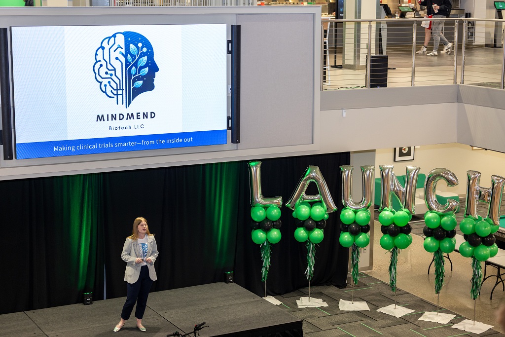 Mercedes Terry on stage, presenting at LAUNCH event in UND Memorial Union