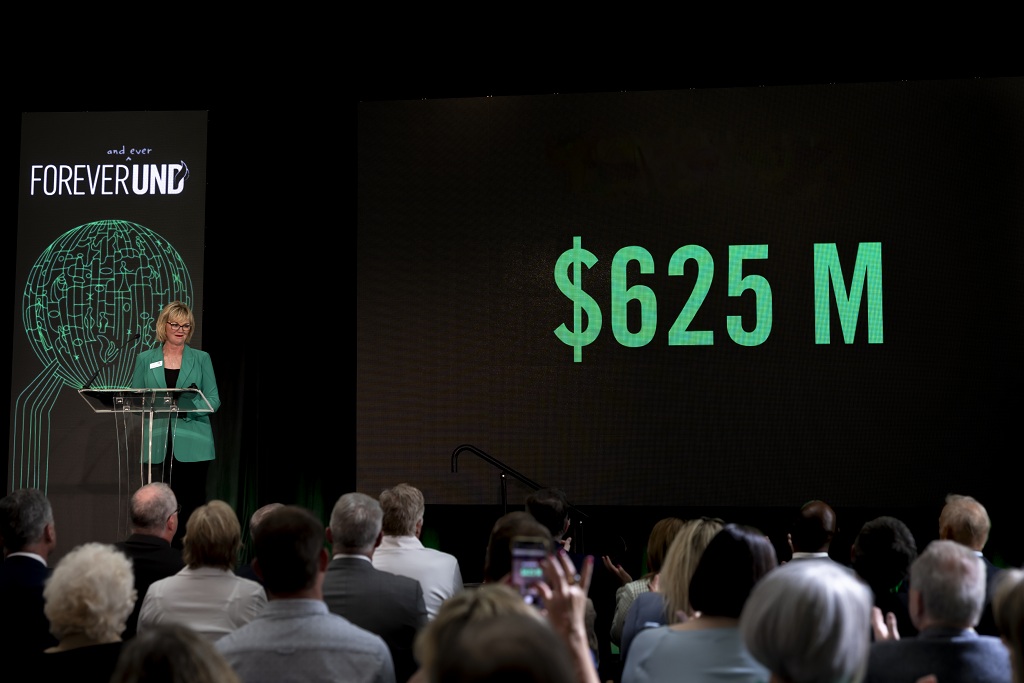 DeAnna Carlson Zink addresses the crowd at a Forever UND event