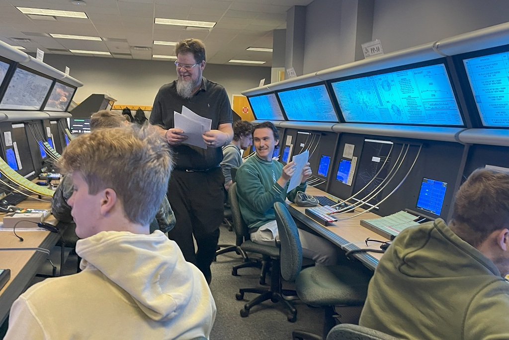 Associate professor Craig Carlson in an aviation class