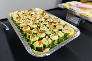 Close-up of tray of Smoked Salmon Cucumber Cups.