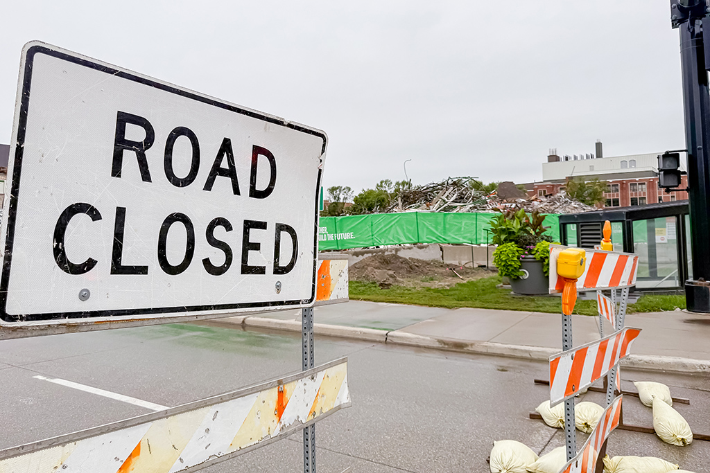 A road closure sign blocks through traffic on Columbia Road.