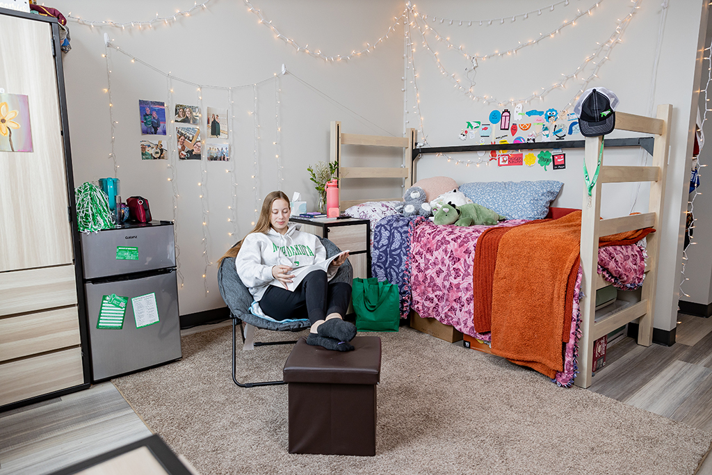 Student studies in residence hall