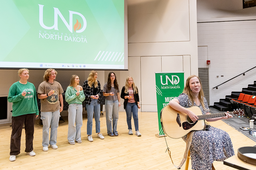 UND Music Therapy Director Carly Flaagan leads an experiential exercise in music therapy.