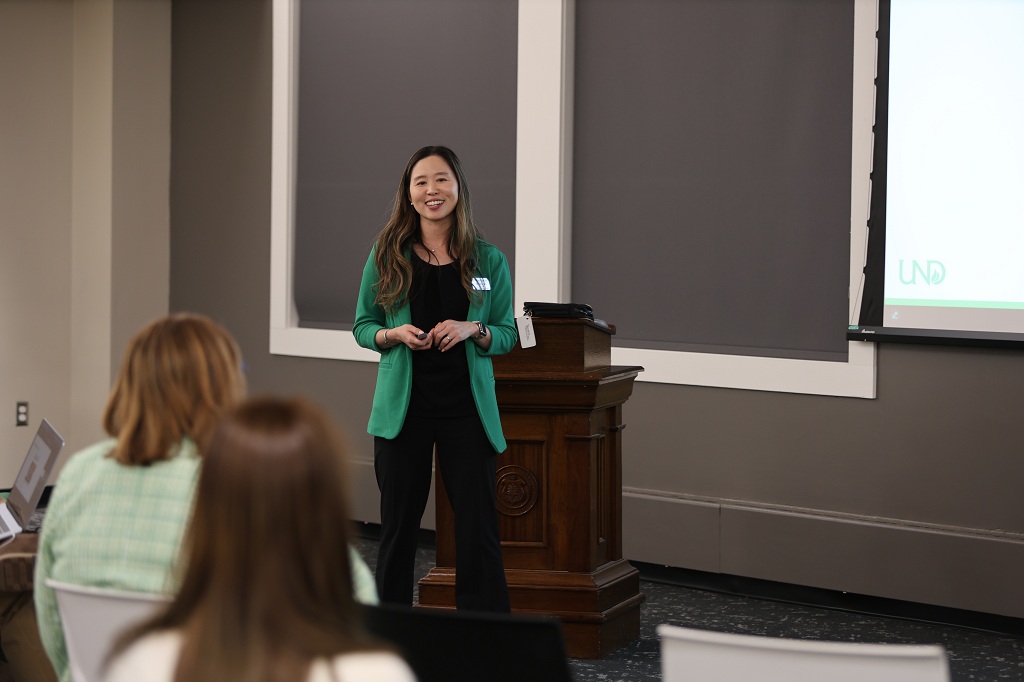 Soojung Kim delivering Randy Rasmussen Lecture in Chester Fritz Library