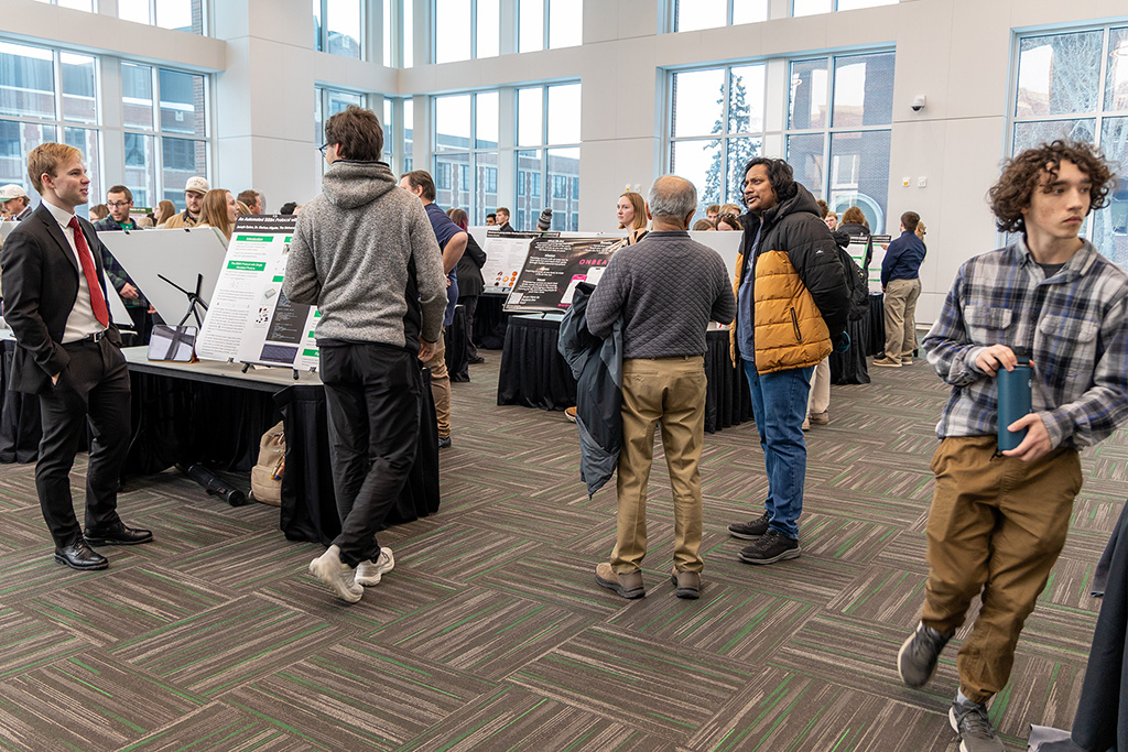 students and attendees at undergraduate showcase.