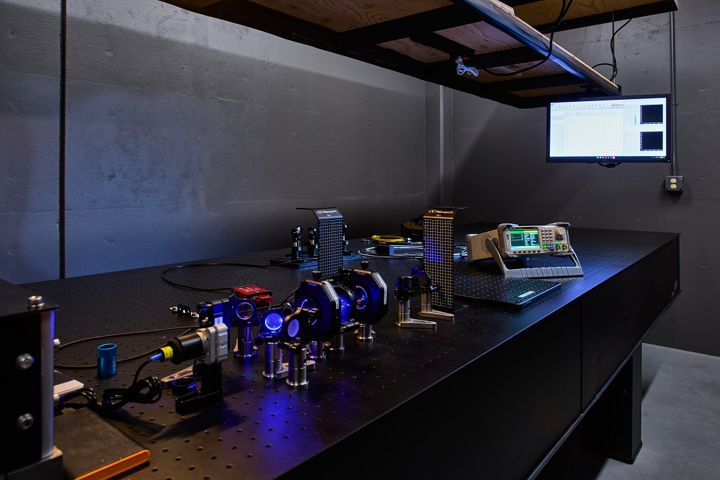 Laser electronics atop an optical table.
