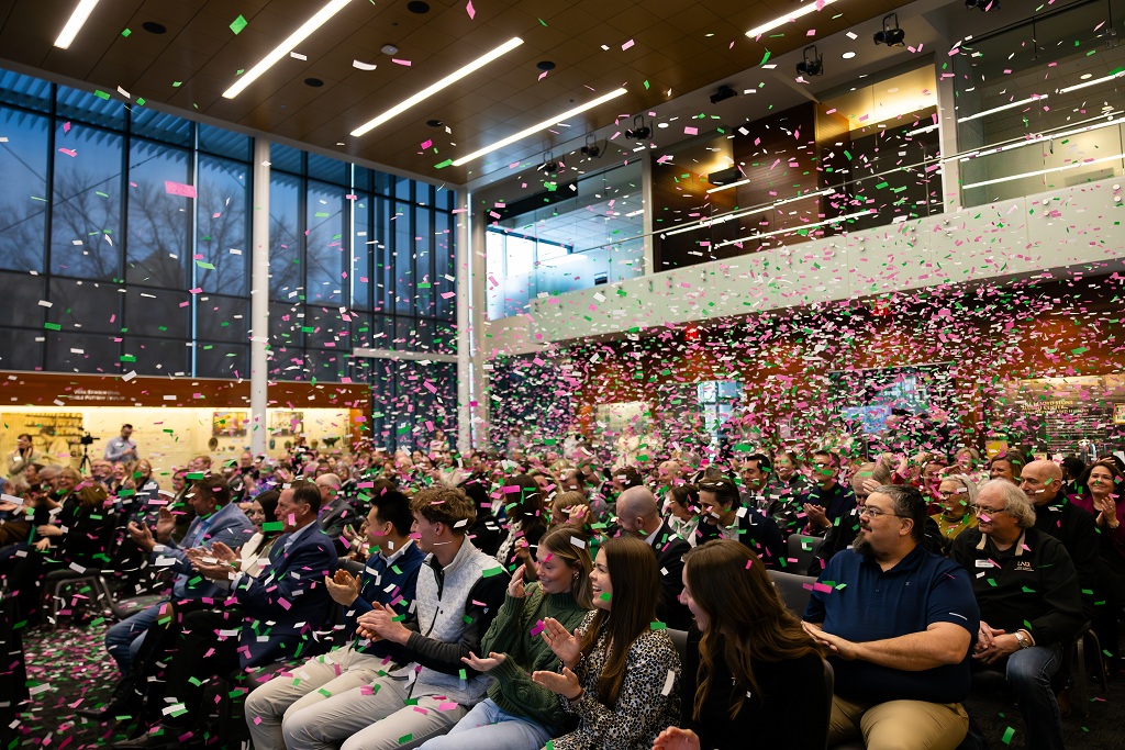 Confetti falls on a crown in the Gorecki Alumni Center at UND.