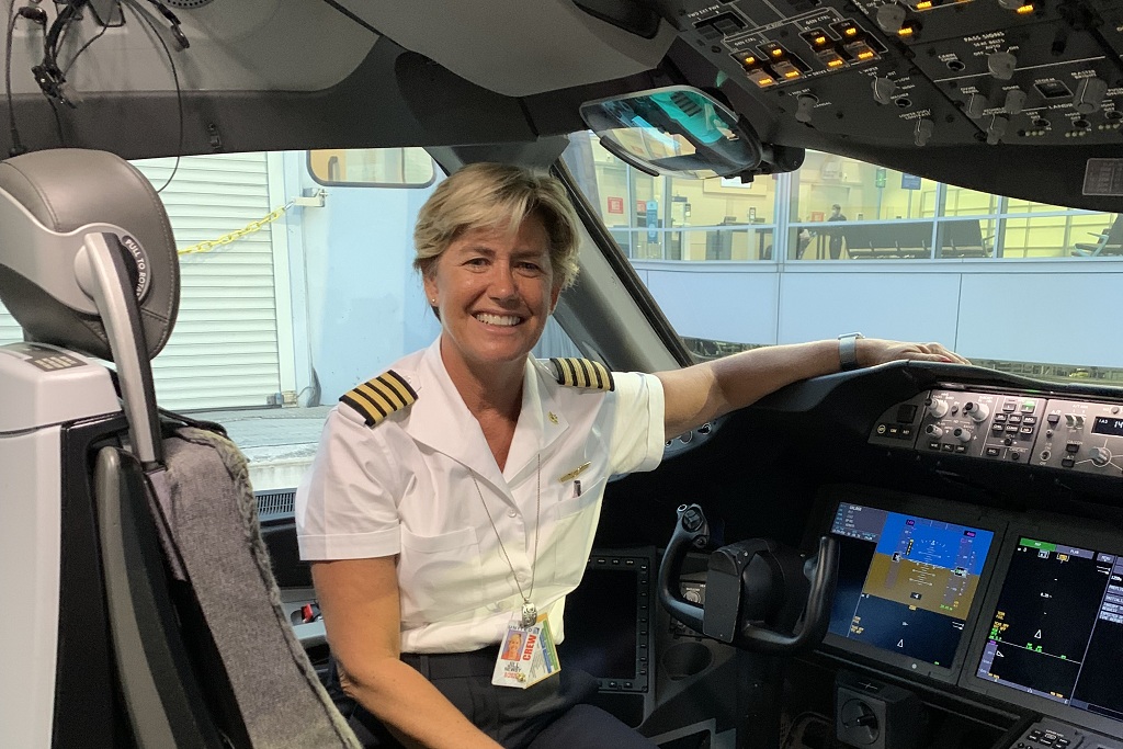 Jill Newby in the cockpit of a Boeing 787 Dreamliner