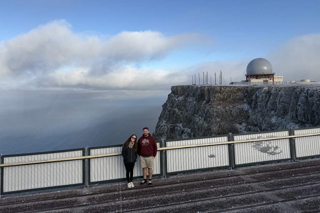 Two UND graduate students pose by an Icelandic overlook