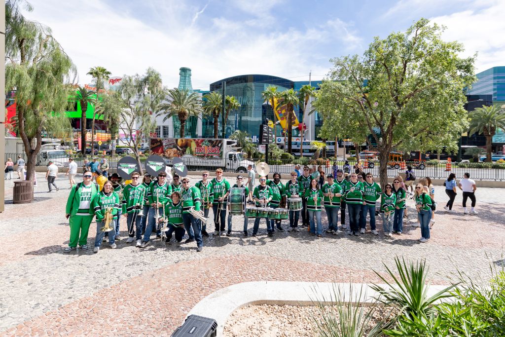 Matt Fowler and Pride of the North Band in Las Vegas at the 2026 Frozen Four.