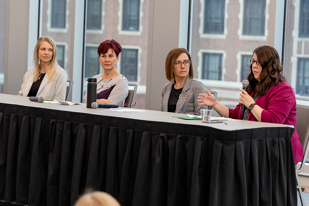 a group of panelists discuss women in STEM