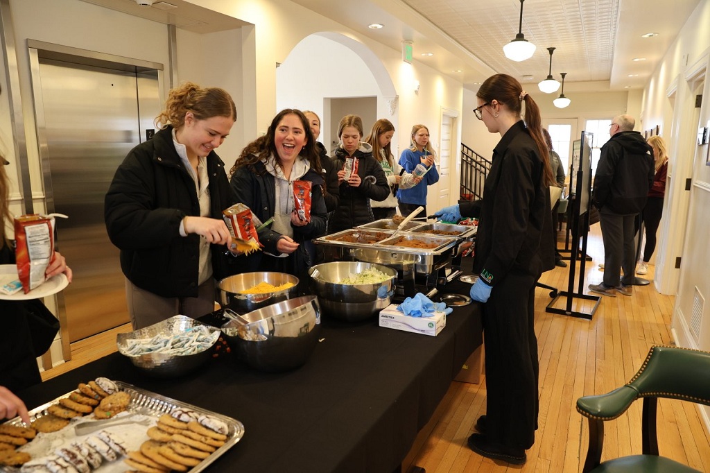 Graduate students partake of a taco bar at Gershman Graduate Center.