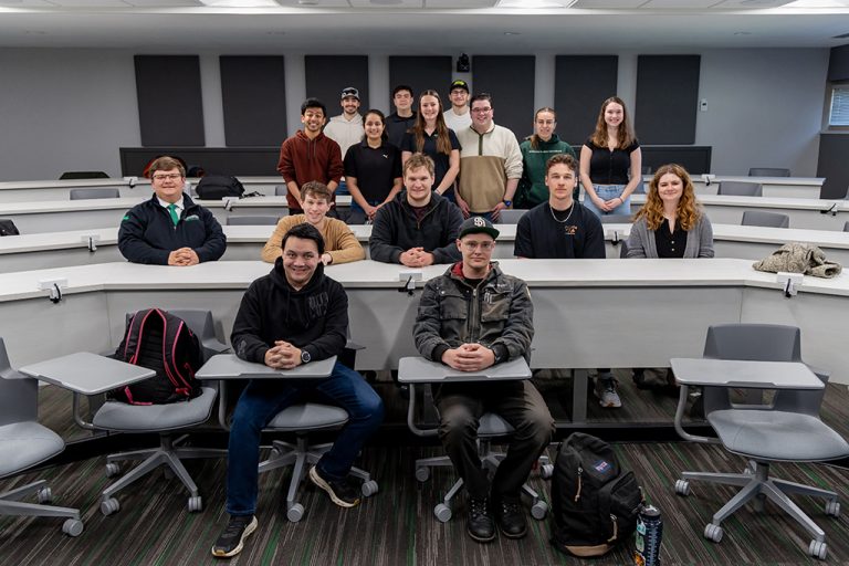 group photo of students in a classroom