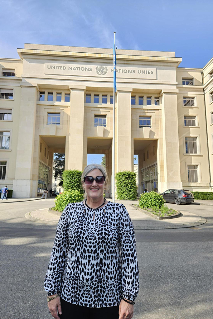 woman in front of building