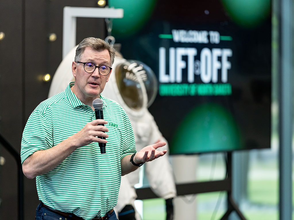 Andy Armacost speaking at lift-off showcase.