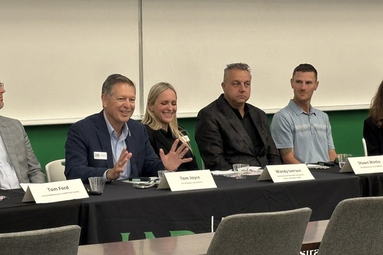Tom Joyce speaks during a panel discussion alongside other local government professionals at UND’s Local Government Night.